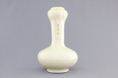 A Chinese Cizhou cream-glazed archaic form vase, 16/18th C.