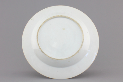 A Chinese famillle rose porcelain plate with ladies in a garden with a qin, Yongzheng, 1722-1735