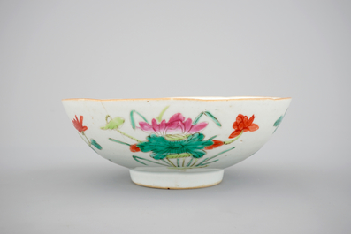 A blue and white Chinese porcelain plate with flowers and a famille rose bowl, 18th C.