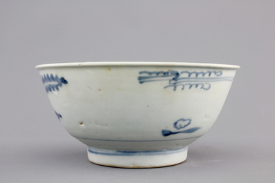 A Chinese blue and white Ming dynasty plate and a Tek Sing cargo shipwreck bowl, 18th C.