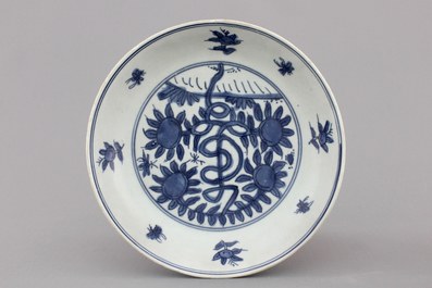 A Chinese blue and white Ming dynasty plate and a Tek Sing cargo shipwreck bowl, 18th C.