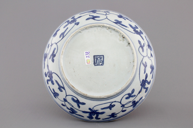 A Chinese blue and white Ming dynasty plate and a Tek Sing cargo shipwreck bowl, 18th C.