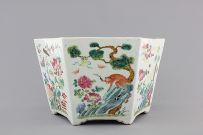A Chinese hexagonal porcelain famille rose jardiniere with animals and flowers, 19th C.