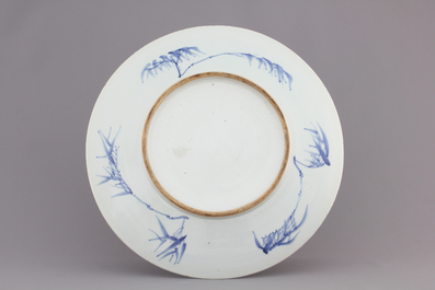 A Chinese porcelain dish with prunus blossoms, 19th C