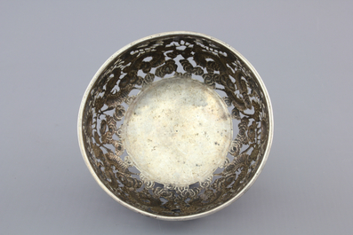 An open-worked Chinese silver dragon bowl, Wang Hing, China, 19th C.