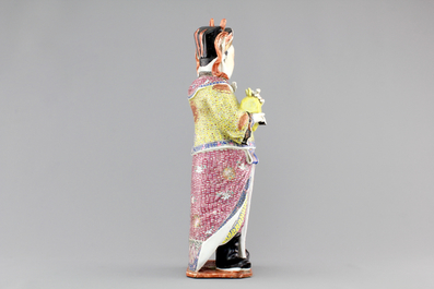 A tall Chinese famille rose porcelain figure of a dignitary, 19th C.