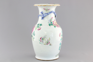 A Chinese porcelain famille rose vase with dragons, 19th C.