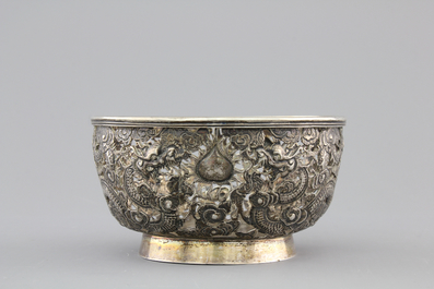 An open-worked Chinese silver dragon bowl, Wang Hing, China, 19th C.