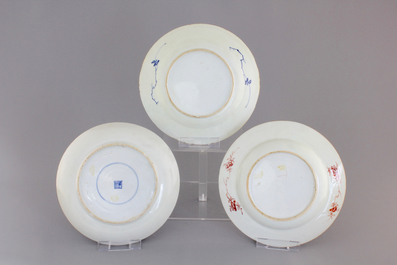 A lot of 3 Chinese porcelain plates: famille verte, blue and white and verte-imari, 18th C.