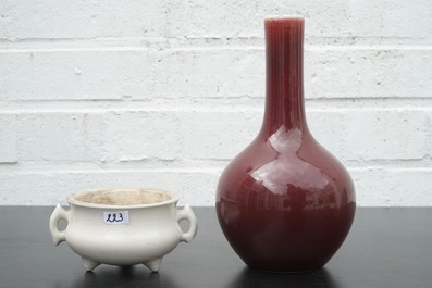 A Chinese sang de boeuf vase, 18/19th C. and a blanc de Chine censer, 18th C.