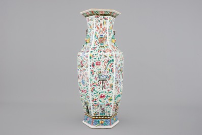 A Chinese hexagonal relief-decorated famille rose porcelain vase, 19th C.