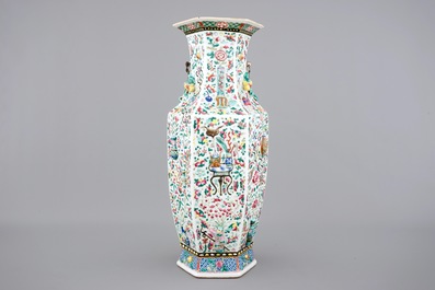 A Chinese hexagonal relief-decorated famille rose porcelain vase, 19th C.