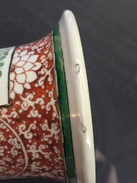 A fine Chinese famille verte and iron red porcelain vase with flowers in a basket, 19th C.