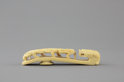 A rare Chinese carved ivory belt hook, 19th C.