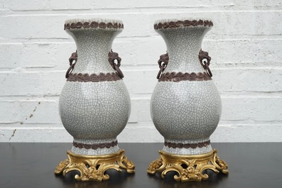 A pair of Chinese crackle glaze vases on bronze mounts, 19th C.