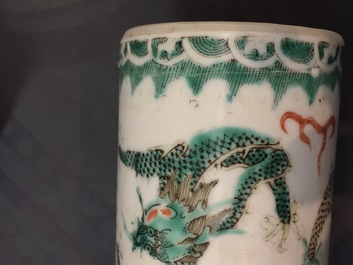 A collection of 19th century Chinese porcelain, including brush pots, figures and a poem plate