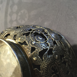 An open-worked Chinese silver dragon bowl, Wang Hing, China, 19th C.