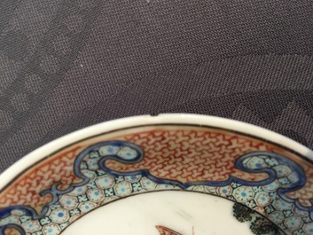 A Chinese export porcelain cup and saucer with a harbor scene, Yongzheng, 1722-1735