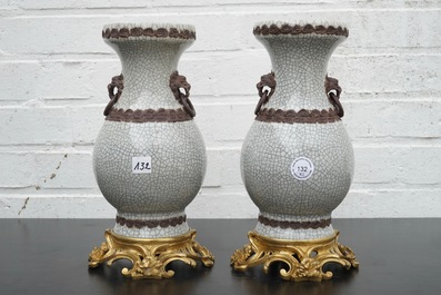 A pair of Chinese crackle glaze vases on bronze mounts, 19th C.