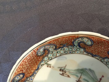 A Chinese export porcelain cup and saucer with a harbor scene, Yongzheng, 1722-1735