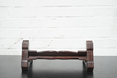 A Chinese dream stone plaque in a carved hardwood stand, 19/20th C.