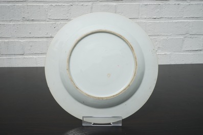 A Chinese famillle rose porcelain plate with ladies in a garden with a qin, Yongzheng, 1722-1735