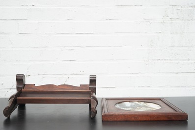 A Chinese dream stone plaque in a carved hardwood stand, 19/20th C.