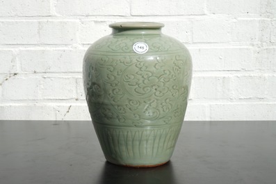 A Chinese porcelain incised celadon vase, Ming Dynasty
