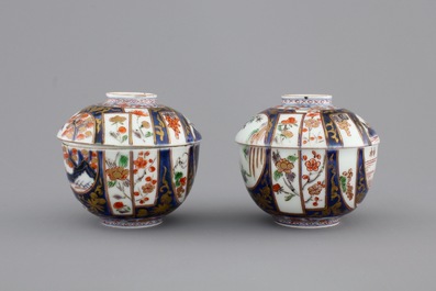 A pair of Japanese Imari porcelain cups and covers on stand, 18th C.