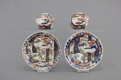 A pair of Japanese Imari porcelain cups and covers on stand, 18th C.