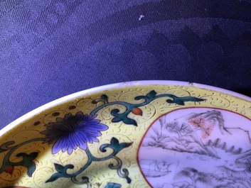 A fine pair of Chinese yellow ground sgrafitto plates, 19th C.