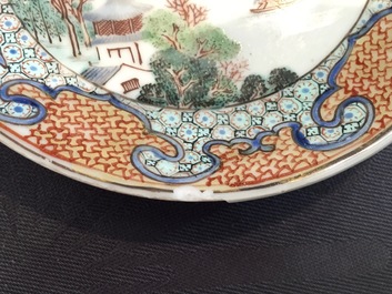 A Chinese export porcelain cup and saucer with a harbor scene, Yongzheng, 1722-1735