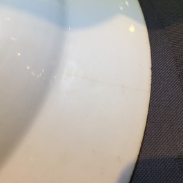 A Chinese famillle rose porcelain plate with ladies in a garden with a qin, Yongzheng, 1722-1735