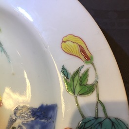 A Chinese famillle rose porcelain plate with ladies in a garden with a qin, Yongzheng, 1722-1735