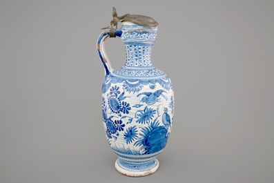 An early Dutch Delft blue and white pewter-mounted jug, 1630-1650