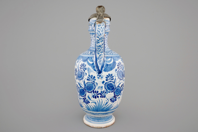 An early Dutch Delft blue and white pewter-mounted jug, 1630-1650