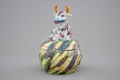 A polychrome Dutch Delftware butter tub with a cow, 18th C.