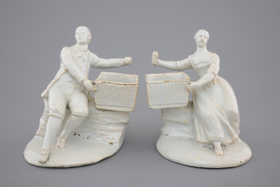 A pair of white Delft figural salts, 18th C.