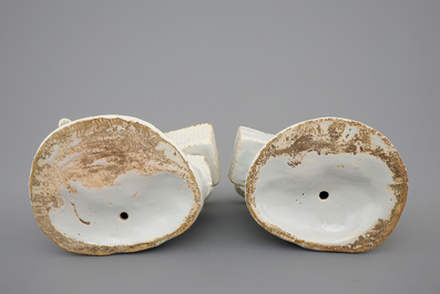 A pair of white Delft figural salts, 18th C.