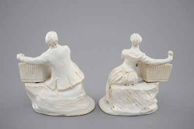 A pair of white Delft figural salts, 18th C.