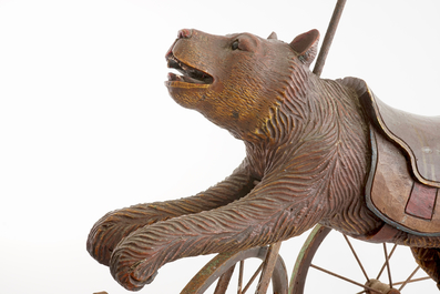 A children's tricycle with a bear, Black Forest, 19/20th C.