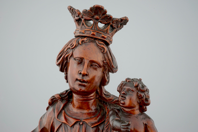 A tall boxwood sculpture of Madonna and Child, 17th C.