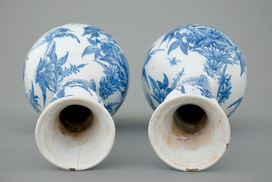 A pair of Dutch Delft blue and white garlic neck vases, 17th C.