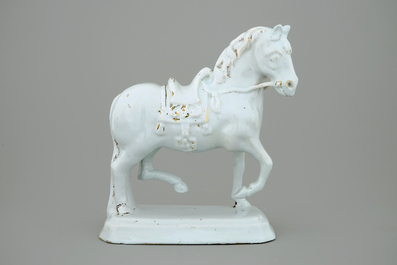 A large white Delft model of a standing horse, 18th C.