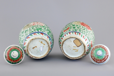 A pair of Chinese wucai porcelain vases with covers, Transitional period, 1620-1683