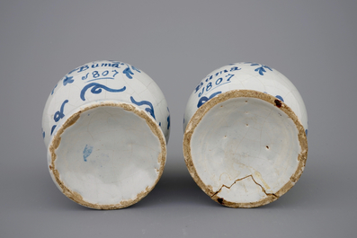 A pair of blue and white money banks, dated 1807, Makkum, Friesland