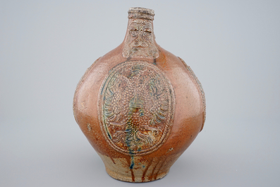 A rare Frechen bellarmine jug with double eagle seals, dated 1604
