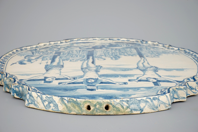 A large Dutch Delft blue and white Crucifixion plaque, Rotterdam, 18th C.