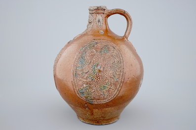 A rare Frechen bellarmine jug with double eagle seals, dated 1604