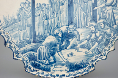 A large Dutch Delft blue and white Crucifixion plaque, Rotterdam, 18th C.